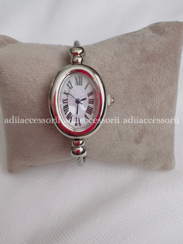 ساعت مچی صفحه بیضی بنگلی